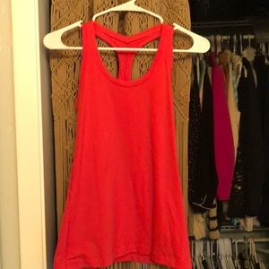 Lululemon coral pink tank top.